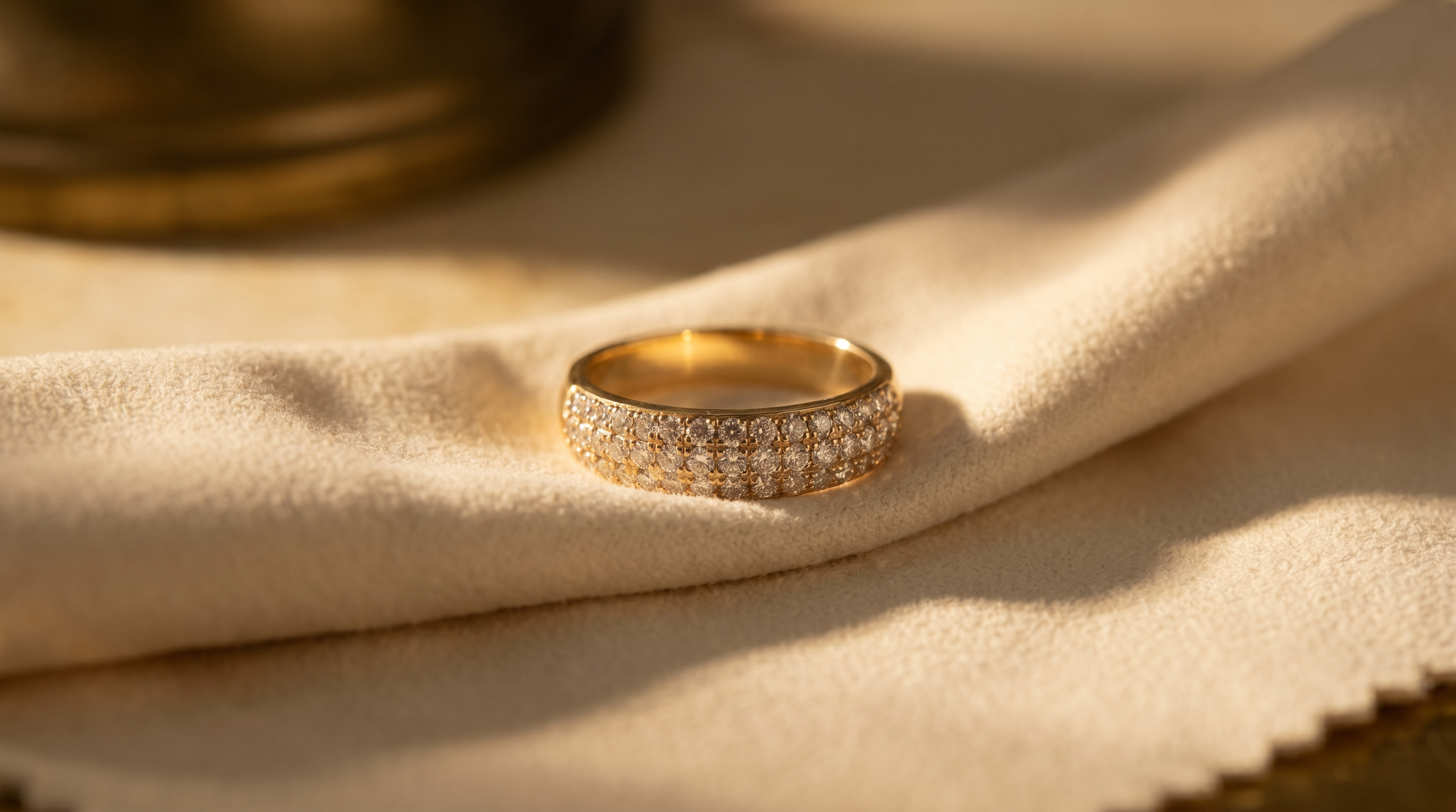 A soft cloth caring for a gold piece